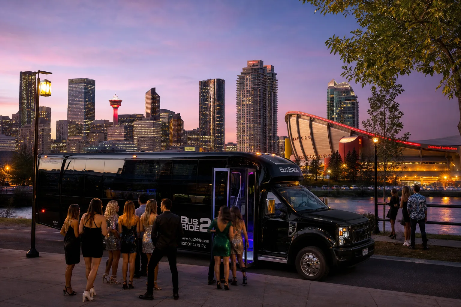 Bus 2 Ride β Calgary downtown skyline dusk with party bus curb pickup near the Bow River